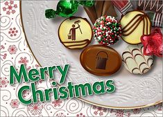 a merry christmas card with cookies and candies on a plate