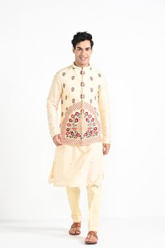 Rajasthani floral Hand embroidered nehru kurta set made in cream bamberg raw silk. Paired with cream slim fit Pant Pajama. Color of the actual garment may vary due to lighting conditions during the shoot.

Size Chart For Men





	
	
					Men's Size Chart
		

		
		
						
				Size Chart For Men
				Custom Size Measurement Guide
			
			
				
				
				Custom Size Measurement Guide
1. Take your measurements at ease…don’t hold your breath!
2. Be a little generous with the measurements. It’s always e Cream Nehru Jacket With Cutdana For Transitional Season, Off White Naqshi Kurta For Festivals, Traditional Off White Nehru Jacket For Eid, Off White Bandhgala With Cutdana For Diwali, Embroidered Cream Bandhgala For Festivals, Festive Off White Bandhgala With Pallu, Festive Off White Designer Nehru Jacket, Beige Nehru Jacket For Festive Transitional Season, Cream Kurta With Pallu For Festivals