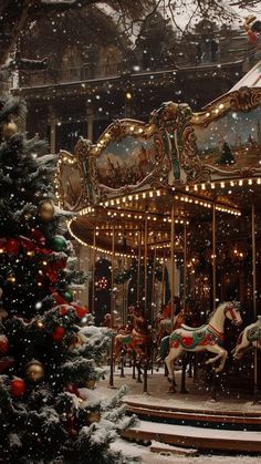 a merry go round carousel in the snow with christmas trees and lights on it's sides