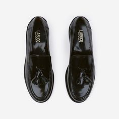 The 1950’s called…they said you look fresh. The Dinner Loafer in black spazzolato leather exudes sophistication. Featuring leather lining, padded insoles with perforations for breathability, and a classic round toe, and finished with handmade looped tassels. Business Tassel Loafers With Patent Leather And Leather Sole, Patent Leather Brogue Loafers With Plain Toe, Patent Leather Plain Toe Loafers With Brogue Detailing, Patent Leather Loafers With Rubber Sole And Almond Toe, Classic Patent Leather Loafers With Stitched Sole, Patent Leather Plain Toe Loafers With Leather Sole, Slip-on Patent Leather Oxfords With Leather Sole, Black Wingtip Tassel Loafers With Rubber Sole, Black Tassel Loafers With Moc Toe And Rubber Sole