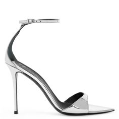 These open and pointed toe mules are crafted from silver mirror-effect synthetic fabric and feature leather soles with logo, matching covered stiletto heels and a crossed strap on the back with a silver metal buckle that provides an adjustable closure. Silver Sandals Flat, Silver Pointed Heels, Grey High Heels, Reflective Fabric, Giuseppe Zanotti Shoes, Suede Mules, Silver Sandals, Pointed Heels, Strap Shoes