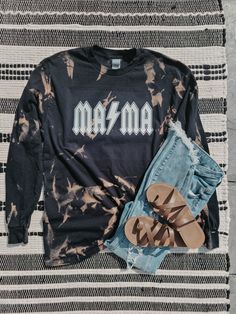 "Acid washed MAMA long-sleeve! -\"Unisex\" So they fit both men and women comfortably. Black Long Sleeve For size reference, photo above is a size medium. PLEASE KEEP IN MIND - No two shirts will come out the exact same. The design pattern will be the same, but the exact placements of the bleached areas, also the intensity of the colors, will all vary shirt to shirt" Faded Stonewashed Long Sleeve Tops, Washed Black Long Sleeve Top With Letter Print, Faded Long Sleeve Tops For Spring, Stonewashed Long Sleeve Tops For Fall, Grunge Long Sleeve Festival Tops, Casual Long Sleeve Faded Tops, Tie Dye Long Sleeve Streetwear Top, Tie-dye Long Sleeve Streetwear Tops, Acid Wash Long Sleeve Tops For Fall