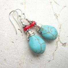 "These beautiful red coral and turquoise dangle earrings will add a pop of color to your ears. A great addition to your spring and summer wardrobe. I generously wire wrapped each turquoise howlite briolette shaped stone with non-tarnish sterling silver wire and added a small genuine red coral bead, then dangled them from sterling silver earwires. They measure 1 1/4\" from the top of the sterling silver earwires. Lightweight and very comfortable for all day wear. Dress these up or down; a great b Vibrant Red Earrings For Gift, Vibrant Red Drop Earrings, Vibrant Red Dangle Earrings, Vibrant Red Dangle Jewelry, Turquoise Dangle Earrings, Red And Turquoise, Turquoise Drop Earrings, Turquoise Earrings Dangle, Beaded Boxes