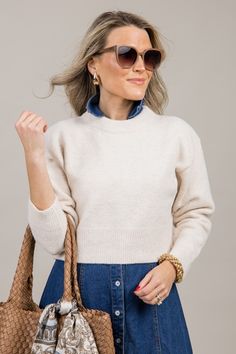 The “Briella Sweater” features a simple color and style. We love the cropped length for high waisted skirts and pants, or even for layering over a dress! See it styled all 3 ways here! also offered in camel Ribbed edges Fabric content: 45% Viscose, 39% Acrylic, 12% Polyester, 2% Alpaca, 2% Spandex Sweater knit offers stretch Fit is true to size. Models (5'3" and 5'4") are wearing size small.  Measurements are... Beige Wool V-neck Sweater For Fall, Chic Beige V-neck Sweater For Layering, Fall Beige V-neck Cropped Sweater, Beige V-neck Sweater With Button Closure, Off Shoulder Jacket, Zara Beige V-neck Sweater, Athleisure Accessories, Waisted Skirts, High Waisted Skirts