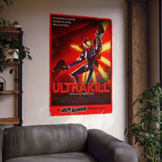 a movie poster hangs on the wall next to a couch