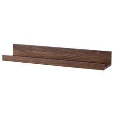 the wooden shelf is made out of wood and has a long, narrow section for storage