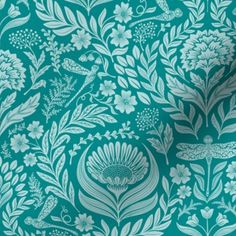 a green and white wallpaper with floral designs