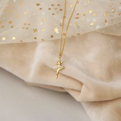 Ballerina Pendant, Gold Ballet slippers, Ballet Necklace for Ballerina Gift, Ballerina necklace, Dancer necklace Our dainty Ballerina necklace is a passionate dancer captured in a miniature charm. Her body dances and strolls around in all its glory with perfect control and strength. Sculpted in sterling silver by hand and set with high craftmanship and attention to detail. - Made in sterling silver, 22 Κ gold plating. - Chain style: Cable  - Chain length: 40 cm or 45 cm (40 cm+5 cm extender)  C Dance Classique, Ballet Necklace, Ballet Gifts, Ballet Jewelry, Dancer Necklace, Ballerina Necklace, Ballerina Gift, Shoe Pendant, Delicate Gold Jewelry