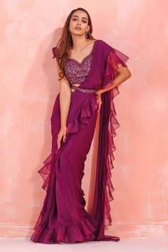 Buy #wine pre-draped #saree with #ruffle border. Comes with embroidered #blouse and belt by #Mirroir at #AzaFashions Shop online now at #Azafashions.com Call +12132135273 or email contactus@azafashions.com for enquiries. #wedding #festive #ethnic #tradional #shopping #shoponline #party #reception #bride Pre Draped Saree With Belt, Saree With Ruffles, Belt Saree Style For Wedding, Designer Saare For Reception, Wine Saree Look For Farewell, Ruffle Saree Designs For Wedding, Indowestern Saree Outfits, Teenage Saree, Belt Saree Style