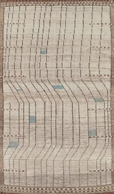 an old rug with blue and brown lines on it