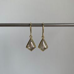 Show-stopping diamond kites framed marvelously in yellow gold. 22k & 18k yellow gold Diamonds, 4.77ctw 10mm x 15mm (3/8" x 1/2") Earrings hang 1 1/16" from the ear Each earring weighs 1.5g