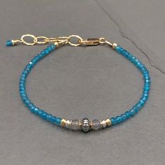 Blue Labradorite Bracelet As A Gift, Blue Labradorite Bracelet, Blue Labradorite Bracelets With Natural Stones, Blue Spiritual Bracelets With Birthstone, Spiritual Blue Birthstone Bracelets, Adjustable Blue Apatite Bracelets, Blue Apatite Bracelet Jewelry, Bracelet Packaging, Chain Making