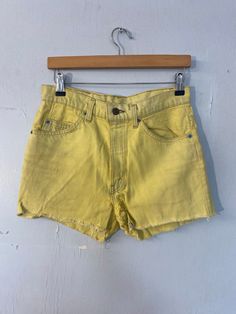 "Vtg Levi denim shorts - over dyed - yellow  W 30\" would fit a 28\" w - depending on desired fit  Rise 12\" Hip 38\"  Levi shorts -  Zipper fly  Professionally over  dyed in the 80 s  condition is good ... Home repair on crotch .... see pic  No tab on pocket   Possible would have been orange tab  Few marks on back of jean - see pic" Levi Denim Shorts, Levis Denim Shorts, Yellow Denim, Sheepskin Coat, Wool Cape, Shearling Coat, Levis Denim, Levi Shorts, Short Cuts