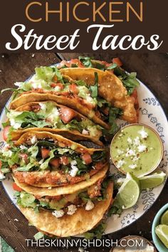 chicken street tacos on a plate with guacamole and salsa