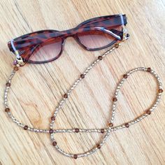 This convertible chain can be used to hold your eyeglasses, sunglasses, or your mask! I strung each bead by hand! Measures approximately 28 1/2" weighs .40 oz. Great news! When you purchase more than one item in the same order, each additional item will ship for FREE! Shop my store: www.etsy.com/shop/MyCraftyCollectibles ALL SALES ARE FINAL - NO REFUNDS OR EXCHANGES. Thank you! Your purchase includes one chain. The sunglasses are NOT included. Photo decorations are not included. Glasses Holder Necklace, Eyeglass Necklace, Photo Decor, Eyeglass Holder, Necklaces, Glasses Chain, Eyewear Accessories, Eye Wear Glasses, Eyewear Sunglasses