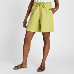 Introducing our Flowy Relaxed Fit Shorts, your go-to for summer style! Crafted from a lightweight linen blend, they offer comfort and breathability. With an 8" inseam, they provide great coverage for all-day wear. Versatile styling options allow you to dress them up or down for any occasion. Casual Linen Shorts For Spring, Versatile Relaxed Fit Summer Shorts, Linen Bottoms For Beach Season And Summer Outings, Casual Linen Bottoms For Beach Season, Spring Linen Bottoms For Day Out, Casual Linen Bottoms For Summer Outings, Versatile Cotton Shorts For Summer, Summer Linen Bottoms With Elastic Waistband, Summer Linen Bottoms