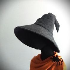 "This witch hat is an ideal for cosplay, Halloween and everyday wizardry.   The peak of hat is about 14\" tall , and brim is about 6\" wide. Sizes: round head 22\", 23\", 24\", 25\", 26\", 27\" & 28\".  If you need any other size, please contact me.    Handmade with durable polyester felt. Fully lined with silky charmeuse. Spot clean or hand wash when needed, line dry. Remove crinkles with steamer, no iron. Each hat will be made to order and ready to ship in 5 business days. Free domestic shippi Leather Witch Hat, Adjustable Brimmed Felt Costume Hat, Adjustable Brimmed Felt Hat For Costume, Halloween Costume Felt Hat, Halloween Fitted Wide Brim Costume Hat, Fitted Wide Brim Halloween Costume Hat, Fitted Hat With Curved Brim For Cosplay, Fitted Curved Brim Hat For Cosplay, Halloween Wide Brim Top Hat