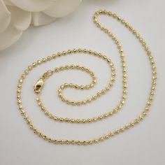 Stunning Solid 14k Gold 22-Inch 2mm Moon Cut Chain. Shiny, Modern, And Everlasting. Perfect For Everyday And Every Occasion. 14k Gold Will Not Tarnish Or Rust. A Chain That Stands Out From The Others. Unisex Materials: 14k Solid Yellow Gold Lenght: 22 Inches (Dm For Different Sizes) Thickness: 2mm Weight: 11.2 Grams Of Pure 14k Gold 14k Stamped Brand New Fast Shipping Perfect Gift. Follow Us For More Fine 14k Gold Jewelry For Fair Prices. Dm Me With All Your Questions. I Will Be Happy To Help Yo Yellow Gold Box Chain Necklace With Beads, Yellow Gold Necklace With Box Chain And Round Beads, 14k Gold Satellite Chain Necklace, 14k Gold Round Satellite Chain Necklace, Yellow Gold Jewelry With Diamond Cut Round Beads, Gold Necklace With Diamond-cut Round Beads, Elegant Jewelry With Rolo Chain And Round Beads, Gold Diamond-cut Necklace With Round Beads, Gold Diamond Cut Necklace With Round Beads