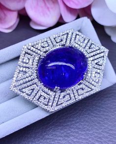 Blue Diamond Gemstone Brooches, Elegant Sapphire Diamond Brooch, Elegant Sapphire Diamond Brooches, Formal Sapphire Diamond Brooch, Formal Sapphire Diamond Brooches, Luxury Evening Jewelry With Cabochon, Fine Jewelry Diamond Gemstone Brooches, Luxury Cabochon Brooches For Anniversary, Luxury Anniversary Brooches With Cabochon