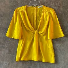 Brilliant Yellow Blouse * Never Used * Still With Tags * Little Sticky Stain Almost Not Noticeable And Could Be Fixed After First Wash. Yellow V-neck Top For Party, Elegant Yellow V-neck Top, Elegant Yellow V-neck Blouse, Zara Yellow Party Top, Yellow Zara Top For Party, Chic Short Sleeve Blouse For Brunch, Chic Short Sleeve Zara Blouse, Chic Zara Short Sleeve Blouse, Chic Yellow V-neck Top