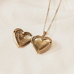 Gold Locket Necklace With Clavicle Chain As Gift, Dainty Locket Necklace For Memorial, Dainty Locket Necklace For Memorials, Gold-tone Chain Necklace With Locket For Gift, Gold-tone Locket Chain Necklace As Gift, Gold Locket Jewelry For Memorial, Gold Locket Necklace For Memorial, Gold Locket Necklace For Memorials, Medallion Locket Chain Necklace Gift