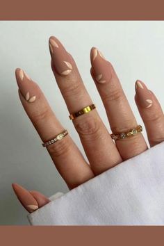 Get ready for the cozy vibes of early fall with these gorgeous nail designs! 🍂🍁 From warm neutrals to bold pops of color, these nails will have you feeling all the autumn feels. #EarlyFallNails #CozyVibes #AutumnFeels #NailInspo #FallMani #NailGoals #SeasonalNails #NailArt #FallColors #PumpkinSpiceEverything Simple Leaf Nail Art, Saggitarius Nail Designs, Neutral Tone Nails, Leaf Design Nails, Nails With Leaf Design, Dainty Nail Designs, Neutral Acrylic Nails, Nature Nails Designs, Dainty Nail Art