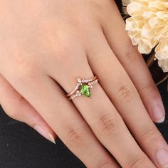 Unique Peridot Engagement Ring Set Dainty Green Gemstone Rose - Etsy Peridot Engagement Ring Silver, Peridot Wedding Rings, Diamond White Emerald Ring With Accent Stones For Wedding, Green Diamond Wedding Ring With Accent Stones, Heart Cut Diamond Emerald Ring For Wedding, Green Birthstone Ring Fine Jewelry For Wedding, May Birthstone Wedding Ring In Marquise Cut, Heart Cut Emerald Ring For Wedding, May Birthstone, Emerald Heart Cut Ring With Prong Setting For Wedding