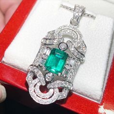 "ENJOY OUR WORRY-FREE SERVICE AND THE DAZZLING, GENUINE JEWELRY WE DESIGN AND HANDCRAFT WITH LOVE❤️ ABOUT THE ITEM: ONE OF A KIND HANDCRAFTED PENDANT! BRAND NEW! \"You will get the best emeralds from the most experienced emeralds wholesaler in the world--So Perfect Jewelry.\"  CERTIFIED, JUMBO, VIVID GREEN EMERALD!! STUNNING, 4.23 total carats, Certified Emerald, ART DECO pendant. UNIQUE DESIGN! ONE OF A KIND! Mesmerizing Zambian emeralds, at 2.55 carats, this emerald is just the right size, wit Platinum Jewelry With Pave Setting As Gift, Exquisite Gia Certified Jewelry Gift, Emerald Jewelry With Pave Setting For Gift, Gia Certified Platinum Jewelry Gift, Gia Certified Platinum Jewelry As Gift, Emerald Jewelry With Pave Setting As Gift, Gia Certified White Gold Pendant Jewelry, Gia Certified Silver Platinum Necklace, Gia Certified Sterling Silver Pendant Necklace