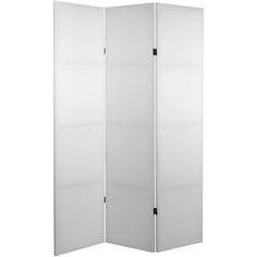 a white room divider with three panels