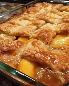 a casserole dish with peaches in it