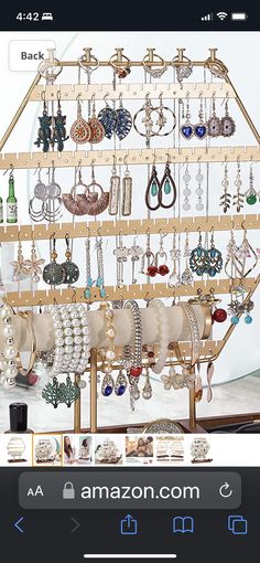 an image of a jewelry rack on the app store's facebook page, which is displaying earrings and necklaces