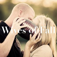 a man and woman kissing while holding a football