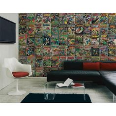 a living room filled with furniture and lots of comics on the wall behind it's couch