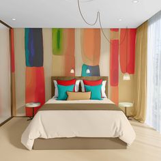 a large bed sitting in a bedroom next to a wall with colorful paintings on it