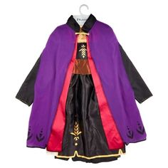 a purple and black coat hanging on a hanger