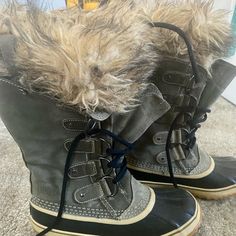 When It Comes To Perfecting Winter Function And Style, No Boot Does It Better Than Sorel's Joan Of Arctic. Featuring Waterproof Suede, A Seam-Sealed Waterproof Design, And A Rubber Sole For Gripit's Not Hard To See Why It's Considered A Winter Essential. Upper: Available In A Waterproof Suede Upper With Faux Fur Cuff Or A Waterproof Suede Upper With Faux Shearling Cuff. Seam-Sealed Waterproof Construction. Laces Are Not Waterproof. Insulation: Removable 6 Mm Washable Recycled Felt Inner Boot. Midsole: 2.5 Mm Bonded Felt Frost Plug. Outsole: Handcrafted Waterproof Vulcanized Rubber Shell With Herringbone Outsole. Heel Height: 1 1/2 In. Platform Height: 3/4 In. Shaft Height: 12 In. Lace Le Sorel Joan Of Arctic, Sorel Womens, Winter Rain, Winter Essentials, Rain Boots, Heel Height, Things To Come, Women Shoes, Boots