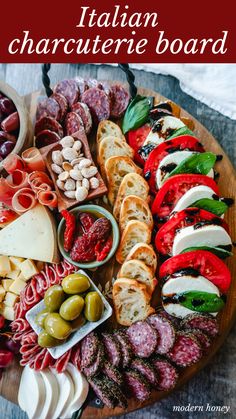 an italian charcuterie board on a wooden platter