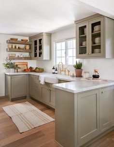 the kitchen is clean and ready for us to use in its new owner's home