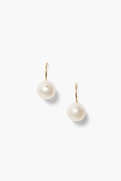 An essential piece you'll reach for everyday, this drop earring features a white freshwater potato pearl drop on an 18k gold plated sterling silver French hook. Pair with dainty gold earrings to perfect the layered look. 18k gold plated sterling silver. 5/8" drop. Handmade in Vietnam. Classic Everyday Pearl Drop Earrings, White Drop Pearl Earrings For Everyday Elegance, Classic White Pearl Earrings In 14k Gold, Classic Pearl Pendant Earrings In 14k Gold Filled, Everyday White Pearl Drop Earrings, Classic 14k Gold Filled Pearl Pendant Earrings, Classic 14k Gold-filled Pearl Pendant Earrings, Classic White 14k Gold Filled Earrings, Classic Pearl Drop Earrings In 14k Gold Filled