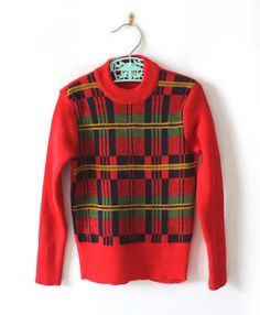 FRENCH VINTAGE 70's, very nice patterned sweater, soft stretchy knit ( acrylic and wool blend ), fully fashioned, geometric pattern. Brand " Marie Lecoeur - Paris " ( French brand but made in Italy ). Size 4 years Vintage condition level 5, new old stock ( washed once ) We assess the condition of our vintage items on a scale from 0 to 5. Level 5 corresponds to an almost new vintage condition. Any defects are systematically reported. Even though in very good condition, vintage items may present i Retro Long Sleeve Argyle Sweater, Retro Plaid Sweater For Fall, Retro Wool Sweater With Fair Isle Pattern, Retro Jacquard Knit Sweater For Fall, Vintage Patterned Winter Sweater, Retro Fall Sweater, Vintage Red Fall Sweater, Retro Argyle Pattern Crew Neck Sweater, Vintage Wool Jacquard Knit Sweater