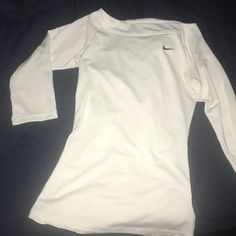 Super Cute Workout Shirt! Never Worn! Fits True To Size! It Is From The Tennis Line Of Nike. Nike Fitted Long Sleeve Tops, Nike Casual Stretch Tops, White Nike Tops For Spring, White Long Sleeve Workout T-shirt, White Cotton Workout Tops, Casual White Workout Shirt, Nike Stretch Crew Neck Tops, Basic White Nike Top, Basic White Workout Top