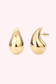 These elegant teardrop earrings are created from smooth gold filled metal, offering timeless sophistication and a luxurious sheen. Perfect for any occasion, they'll bring a touch of classic luxury to your outfit. Earring Size: 1" 18k Gold Filled Stud post Platform Heels Boots, Sandal Platform, Blue And White Dress, Platform Sandals Heels, Water Drops, Bow Headband, Jewelry Bags, Teardrop Earrings, Platform Heels