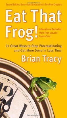 a frog sitting on top of a clock with the words eat that frog written above it