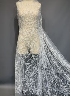 Delicate and romantic couture embroidered with sequins, beads and 3D knots of soft tulle lace for wedding dress. Item Number: AM22005. Width of embroidery is 137 centimeters, width of the mesh is 165 centimeters. Polyester mesh (white color), embroidery - sequins (2 types), beads and 3D knots of soft tulle (white color).  The price indicated for one rapport (35 centimeters). I cut the fabric to preserve the pattern. In case of order few rapports, they will be in continuous one piece. If you need Color Embroidery, Dress Item, For Wedding Dress, Etsy Wedding Dress, Soft Tulle, Dress Inspo, Tulle Lace, Embroidered Lace, Cyprus