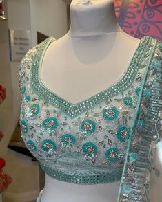 👉 Product Specification Fabric :- Raw silk (Lehenga,Blouse) Net (Dupatta) Lehenga :- M size in Inches ( Weist 30, Hip 40, Length 40) Blouse/Choli :- M size in Inches (Weist 30, Bust 36, Length 15) Dupatta :- Organza silk  Border ( 2.5 Mtr) Work :- Embroidery Mirror work Care :- Dry Clean Type : Party Wear Lehenga Choli, Engagement Lehenga choli, Wedding Lehenga Choli DISCLAIMER :- 👉  The actual colour of the product may vary slightly from the image shown. 💃 Could be adorning for special occasions like Marriages, Event, Engagement Function, Casual, Wedding, Ceremony, Festive, Party and many more as you want. 💃  We hope that you will provide accurate measurement for best fitting of the dress. We Also Made Wedding Lehengas, Indian Lehenga, Bridal Lehenga, Designer Lehenga, South Indian Dr Diwali Net Choli With Zari Work, Semi-stitched Net Choli With Pallu, Anarkali Net Choli For Festivals, Wedding Lehenga With Semi-stitched Blouse, Bollywood Style Net Lehenga For Festivals, Bollywood Choli For Festivals, Festive Net Blouse Piece With Pallu, Net Blouse Piece With Pallu For Reception, Diwali Organza Choli With Unstitched Blouse