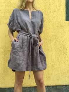 "Loose linen tunic with pockets. Great choice when you need comfortable and stylish outfit combination. You can wear it with trousers, leggings, shorts, skirts. The good thing about tunics is that you can wear them also by themselves with nothing or for example as beach cover ups. Linen tunic dress is perfect for warm days and vacation. As linen regulates body temperature, is lightweight and really absorbent, which makes it the perfect fabric for summer. ABOUT Length of this linen tunic in front Spring Linen Beach Dress With Pockets, Summer Linen Tunic Dress, Relaxed Fit Linen Dress With Pockets For Vacation, Bohemian Tunic Dress With Pockets, Spring Short Sleeve Tunic With Pockets, Relaxed Fit Flax Linen Dress With Pockets, Spring Bohemian Linen Dress With Pockets, Beach Linen Dress With Slip Pockets, Bohemian Linen Dresses With Pockets