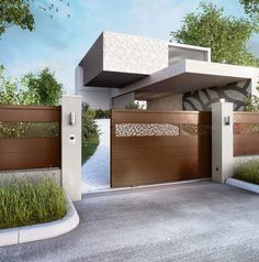 a modern house with two garage doors on the front and one above the entrance to the driveway