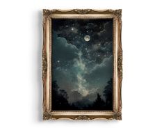 the night sky with stars and clouds is framed in an ornate gold frame