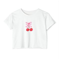 Get everyone ready for the festival season with a beautiful crop top.  Coquette Crop Top. Coquette Aesthetic, Coquette, Ribbon, Cherries, Women's Festival Crop Top, Valentine's Tee, Graphic Tee, Gift for her.  This Cherry/Bow top is soft and durable enough to last the whole party weekend. It has that effortlessly stylish fit with raw-edge sleeves and hems and a cropped, relaxed fit.  .: 65% polyester, 35% combed, ring-spun cotton .: Extra light fabric Coquette Ribbon, Festival Crop Tops, Bow Top, Aesthetic Coquette, Cropped Tube Top, Week End, Tube Top, Festival Season, Womens Clothing Tops