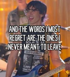 a man with glasses and a guitar in front of him that says, and the words i most regret are the ones i never meant to leave